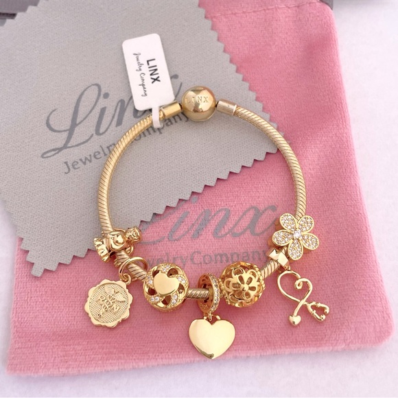 Linx Yellow Gold Snake Chain Bracelet with Registered Nurse Themed Charms - Picture 6 of 14